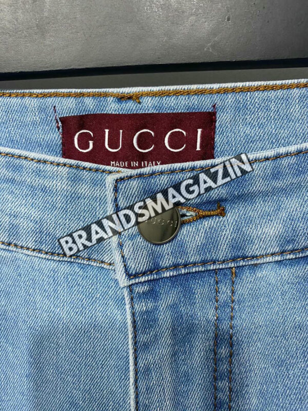 Джинсы Gucci BM47468775777 2