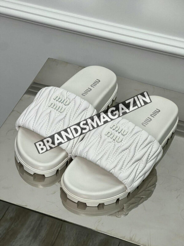 Шлепанцы MIU MIU BM71372577