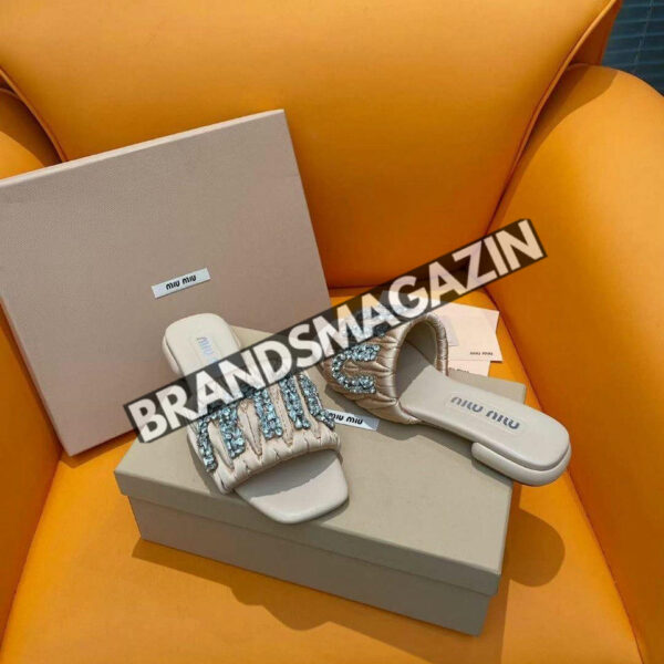 Шлепанцы MIU MIU BM70646577