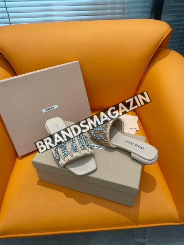 Шлепанцы MIU MIU BM70646577