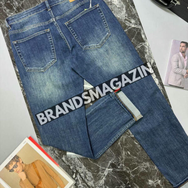 Джинсы Gucci BM46870409277