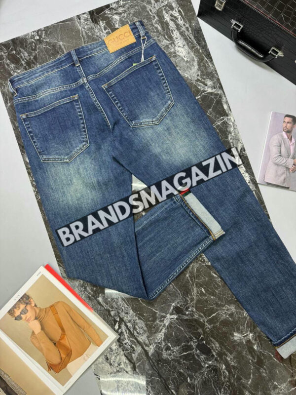 Джинсы Gucci BM46870409277